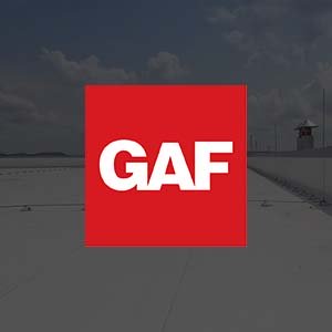 Utah Elite Roofing GAF Commercial Roofing GAF logo on top of commercial roof image
